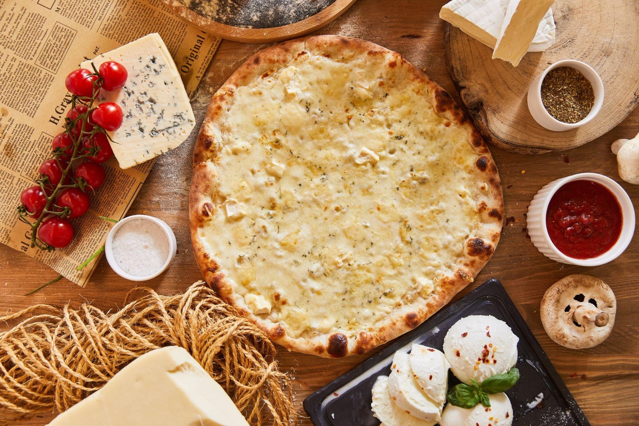 Pizza - o scurtă istorie a celui mai îndrăgit fel de mâncare